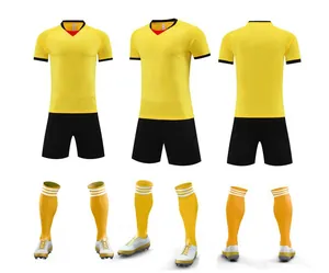 Comprehensive detail view of yellow and black soccer uniform set including jersey and shorts