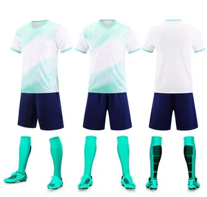 Professional soccer uniform set featuring white wavy print jersey and navy blue shorts