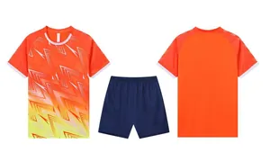 Ensemble maillot de football dégradé orange jaune motif éclair et short bleu marine