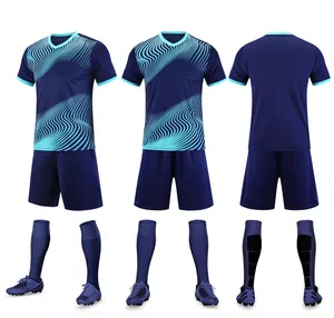 Professional navy blue soccer uniform set featuring jersey, shorts, socks and purple cleats