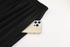 Close-up detail of breathable black athletic shorts showing elastic waistband and side pocket