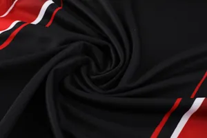Gros plan sur le tissu en maille respirante et séchage rapide pour maillot de football