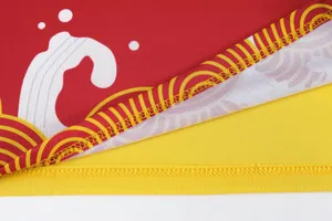Macro detail of breathable dragon boat jersey fabric with intricate wave patterns