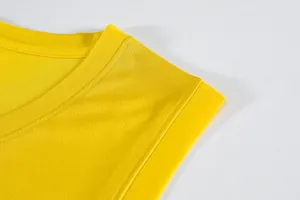 Macro view of yellow mesh athletic jersey neckline and shoulder stitching detail