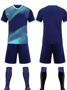 Navy and cyan wave pattern soccer jersey set with shorts and socks for team training