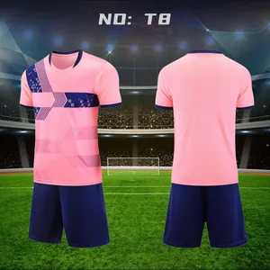 Detailed view showing the front and back of the pink and navy soccer training kit