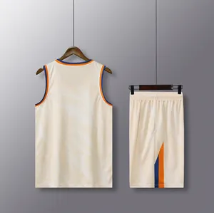 Back view of quick-dry cream basketball jersey and shorts set with orange and blue trim