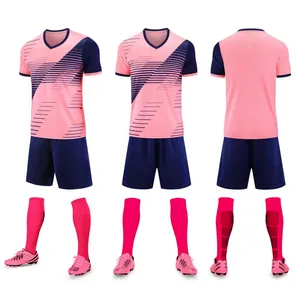Front and back detail view of the pink and navy blue soccer jersey set for kids