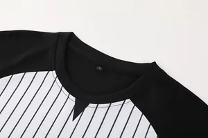 Detail shot of professional striped basketball referee shirt neckline with size L tag