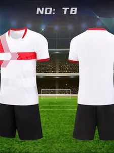 Kids white soccer jersey set with red patterns and black shorts for training