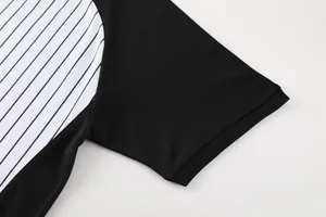Detail shot of the sleeve and stripes on a professional basketball referee shirt