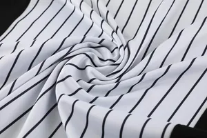 Close-up detail of white and black striped fabric texture for basketball referee jersey