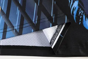 Close-up detail of table tennis jersey hem showing breathable mesh fabric and stitching