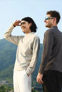 Professional men's long-sleeved half-zip athletic shirt for running and fitness training.