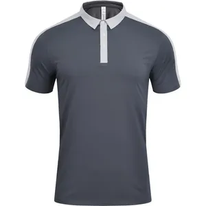 Polo homme respirant à séchage rapide, design color-block en gris foncé et gris clair.