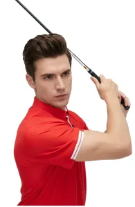 Male model in a red sports polo shirt swinging a golf club on a white background