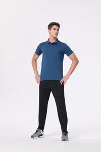 Male model wearing a blue short-sleeved quick-dry polo shirt against a white background