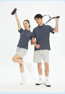 Models wearing moisture-wicking sports polo shirts in a tennis-themed studio shot