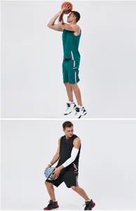 Scatto di dettaglio di un modello che indossa completi da basket verdi e neri.