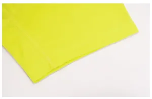 Close-up of quick-dry fluorescent green T-shirt showing fine stitching and fabric texture