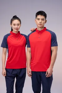 Detail view of red and navy quick-dry sports polo shirts on male and female models.