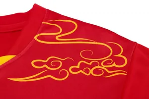 Close-up of golden dragon pattern on red quick-dry dragon boat racing jersey shirt