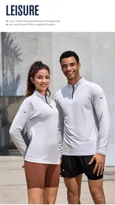 Modelli che indossano top sportivi bianchi a maniche lunghe con cerniera all'aperto