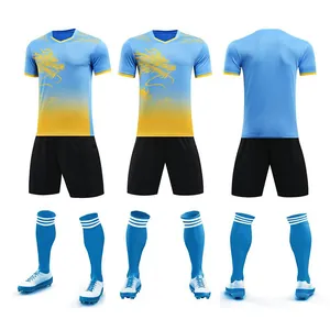 Detail of dragon boat racing jersey set with yellow dragon pattern and blue gradient