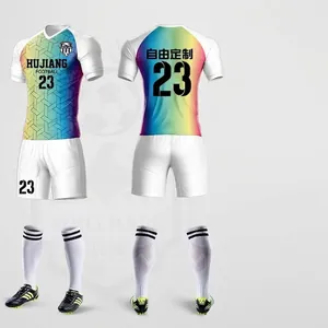 Full custom soccer uniform set featuring vibrant rainbow gradient and team logo details