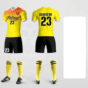 Custom retro soccer jersey set with yellow gradient, black shorts and numbering.