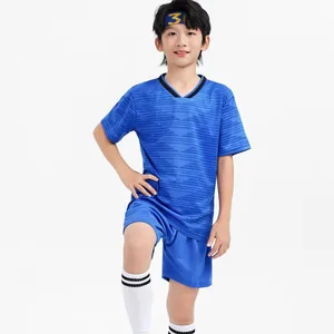Kids blue football kit featuring short sleeve jersey and shorts for sports training