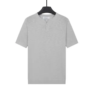 Grey knit short-sleeved Henley shirt for men with minimalist premium design