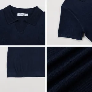 Detail view of a men's navy blue ice silk knit Polo shirt featuring a seagull collar.