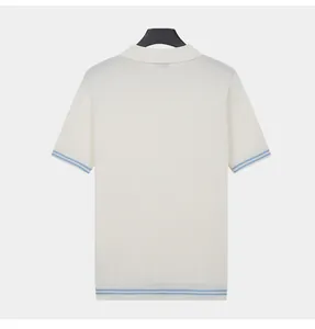 Back view of a men's off-white knitted polo shirt with light blue striped cuffs and hem