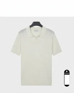 Detail view of the elegant cream white knitted polo shirt for men in breathable summer fabric