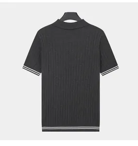 Back view of men's dark grey ribbed knit polo shirt with white striped trim details