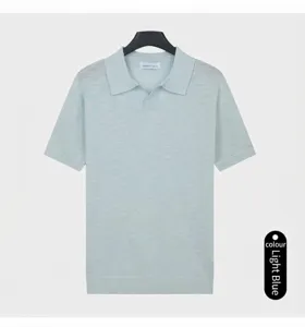 Close-up detail of a light blue knitted polo shirt with a stylish breathable texture