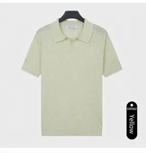 Close-up of a men's light green short-sleeved knitted polo shirt with a V-neck collar