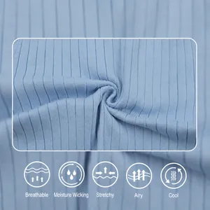 Macro view of breathable blue ice silk fabric with vertical stripes for men's polo shirts.