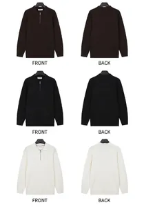 Close-up detail of men's half-zip ribbed knit polo sweater in white, black, and brown