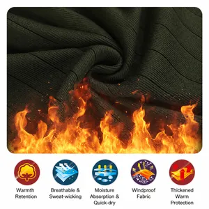 Close-up of dark green textured knit cardigan showing thermal and breathable features