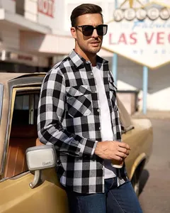 Close-up of a men's classic black and white buffalo plaid shirt with chest pockets