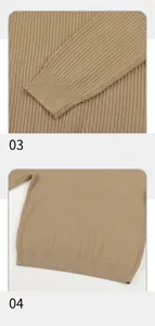 Dettaglio macro del maglione in maglia con polsino elastico e orlo rinforzato.