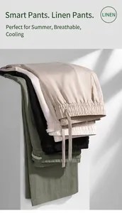 Stack of premium men's breathable linen casual pants in various colors for summer