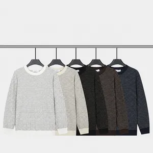 Men's classic crewneck textured knit sweater in various colors on hangers