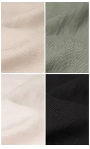 Macro detail of breathable herringbone weave fabric in beige, green, white, and black colors