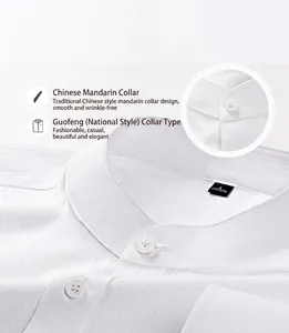 Close-up detail of white men's shirt with mandarin stand collar and button texture