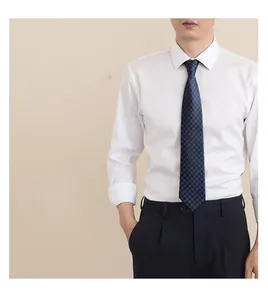 Professional white long sleeve shirt with classic patterned tie for business formal wear