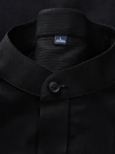 Premium black men's shirt featuring a Chinese stand-up collar and subtle textured fabric
