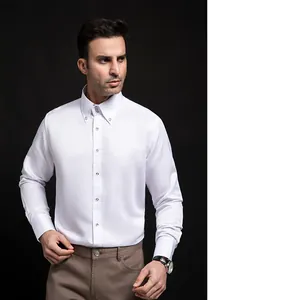 Detail of premium white long-sleeve men's business casual shirt with diamond buttons